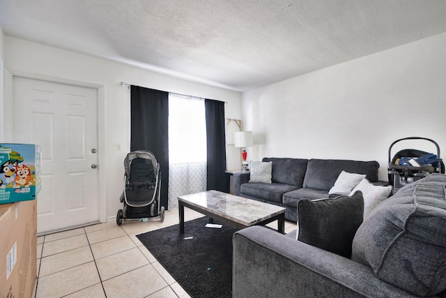 tiled living room with a textured ceiling