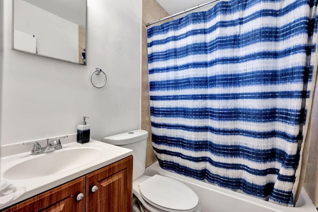 full bathroom with shower / bathtub combination with curtain, vanity, and toilet