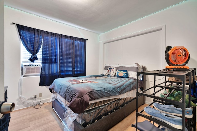 bedroom featuring light wood-type flooring