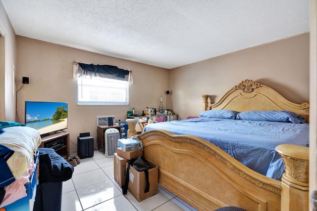 tiled bedroom with a textured ceiling