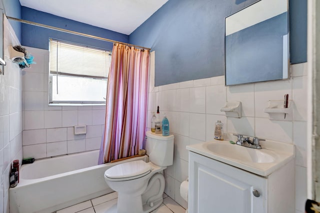 full bathroom featuring vanity, tile patterned floors, toilet, tile walls, and shower / tub combo with curtain