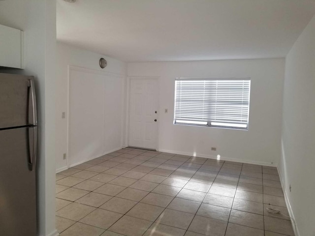 view of tiled spare room