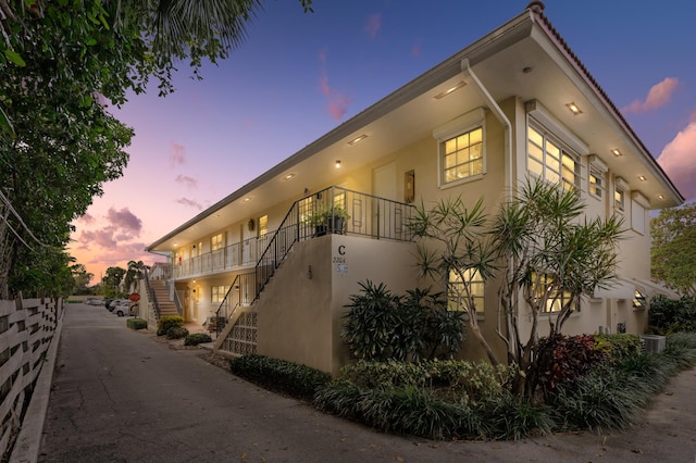 view of property exterior at dusk