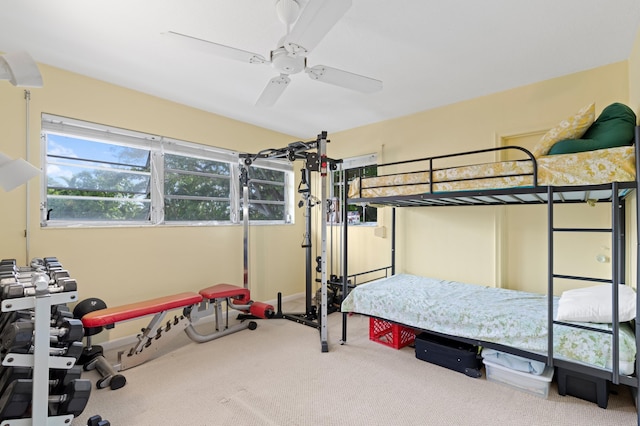 carpeted bedroom featuring ceiling fan