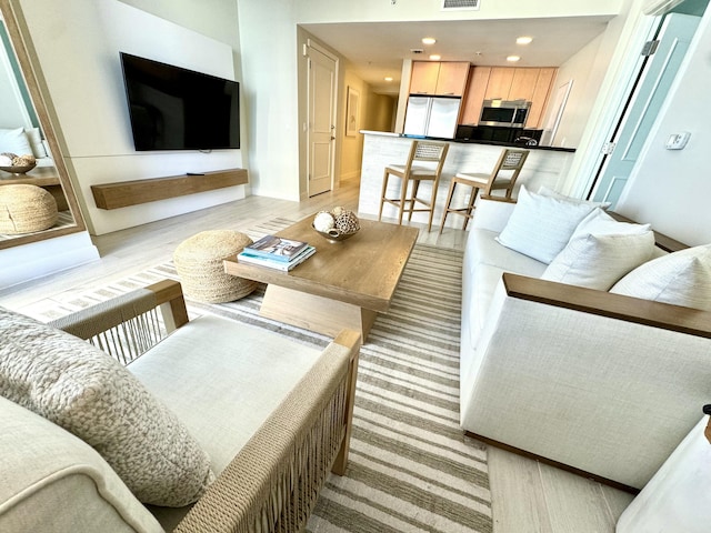 living room featuring light hardwood / wood-style flooring