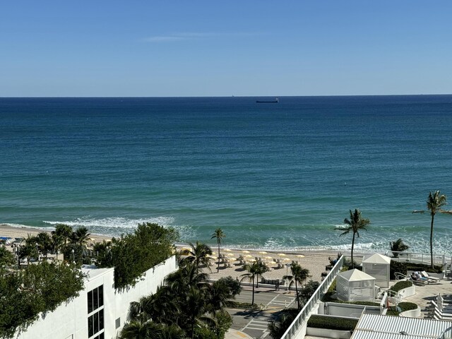 property view of water featuring a beach view