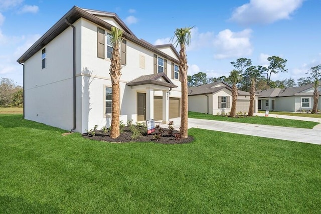 exterior space with a garage and a yard