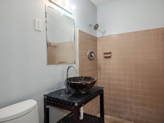 bathroom featuring sink and toilet