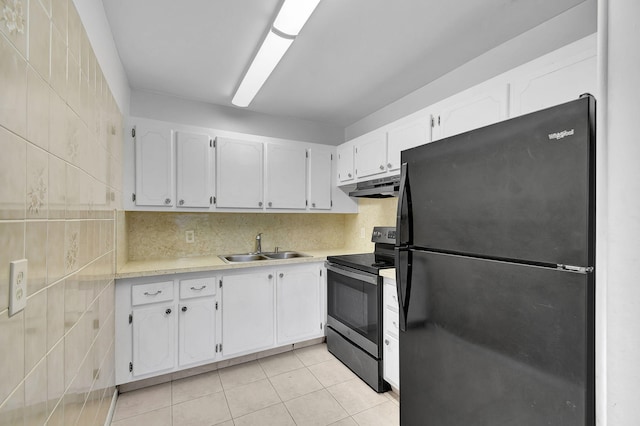 kitchen featuring black appliances, white cabinetry, sink, and light tile patterned floors