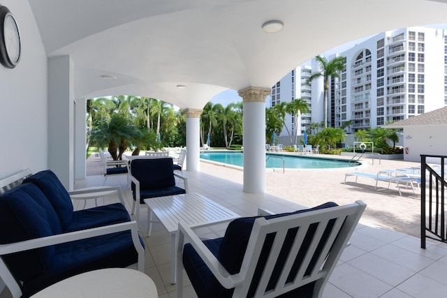 view of swimming pool with an outdoor hangout area and a patio