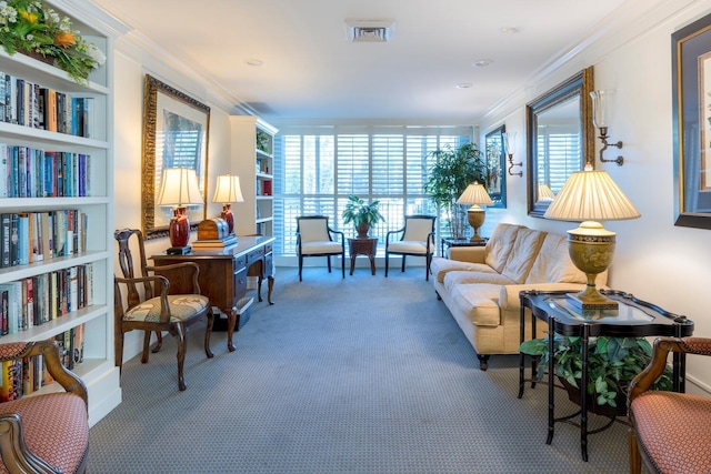 living area featuring built in features, carpet, and ornamental molding