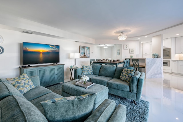 living room featuring ceiling fan