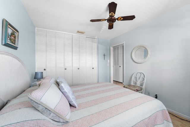 bedroom with ceiling fan and light hardwood / wood-style floors