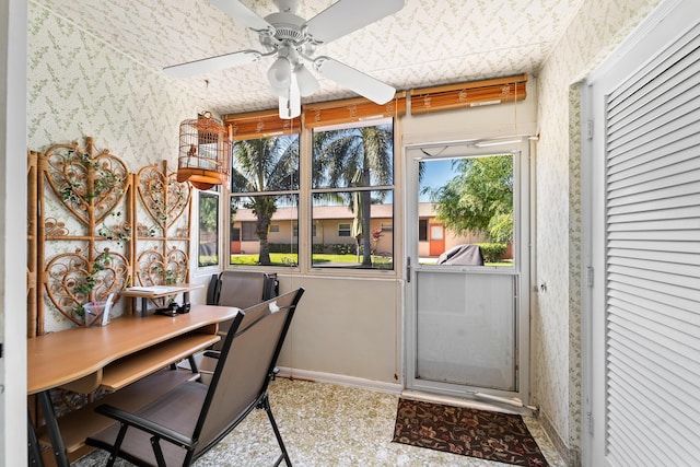 sunroom / solarium with ceiling fan