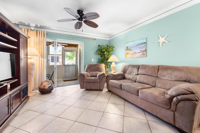 tiled living room featuring crown molding and ceiling fan