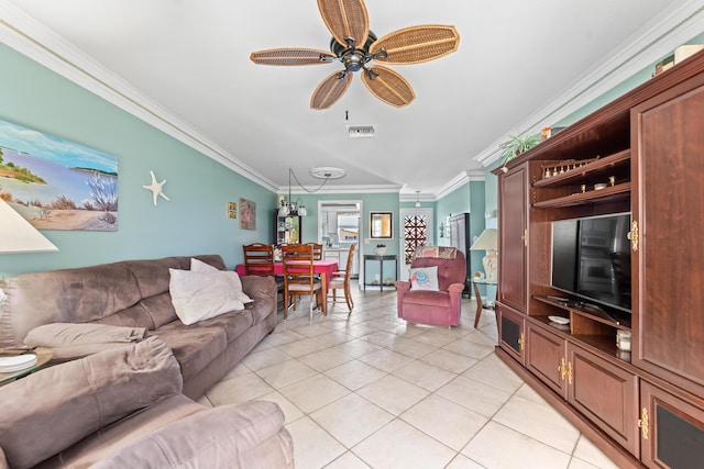 living room featuring ceiling fan, light tile patterned flooring, and ornamental molding