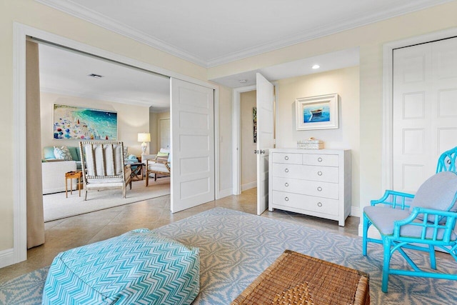 living area featuring ornamental molding and light tile patterned floors