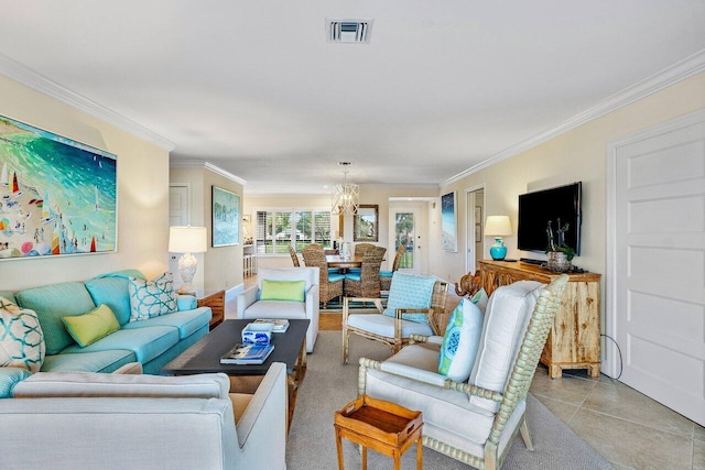 living room featuring light tile patterned floors, a notable chandelier, and ornamental molding