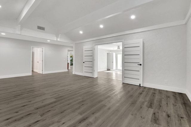 interior space with dark hardwood / wood-style flooring, high vaulted ceiling, and beamed ceiling