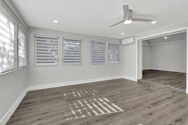 unfurnished bedroom with a wall mounted AC, a closet, ceiling fan, and dark hardwood / wood-style floors