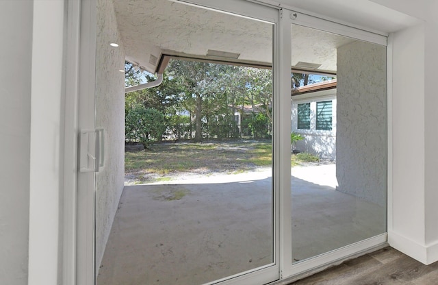 doorway featuring hardwood / wood-style flooring