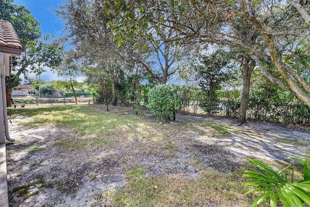 view of yard featuring fence