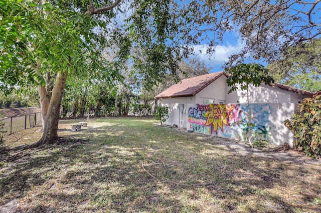 view of yard with fence