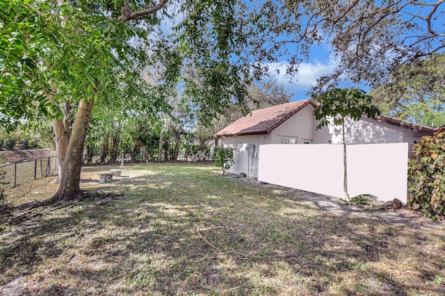 view of yard with fence