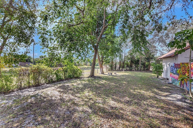 view of yard with fence