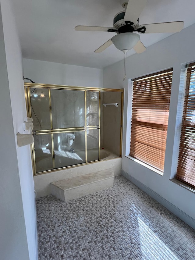 bathroom with a wealth of natural light and ceiling fan