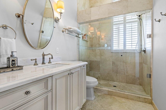 bathroom with toilet, vanity, tile patterned floors, and an enclosed shower