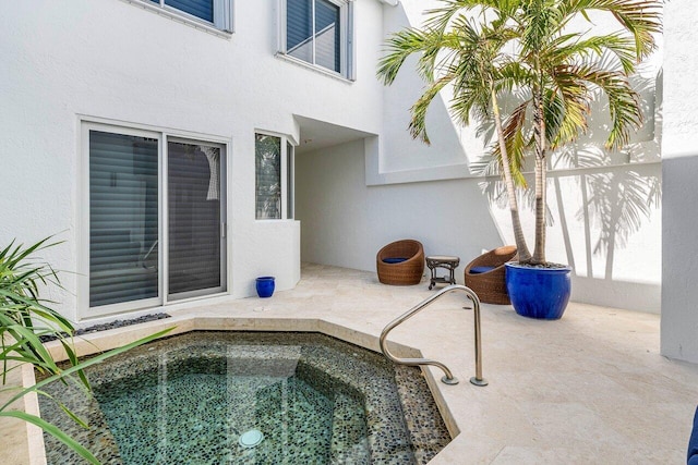 view of pool featuring a patio