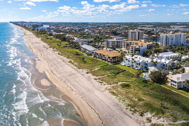 aerial view with a beach view and a water view