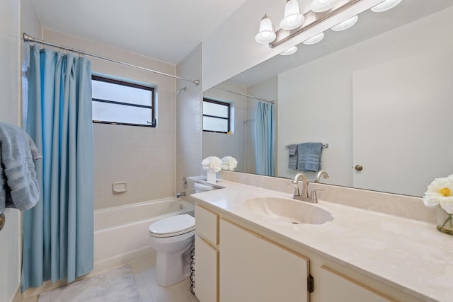 full bathroom featuring toilet, shower / bath combination with curtain, vanity, and tile patterned floors