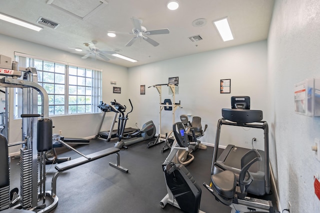 workout area with ceiling fan