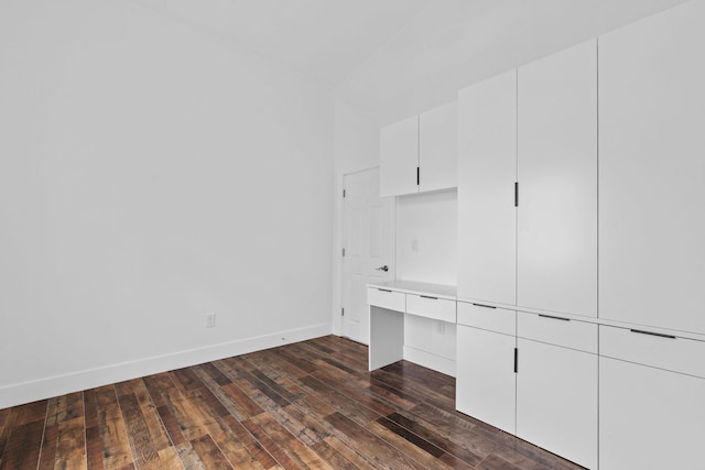 interior space featuring a closet and dark wood-type flooring