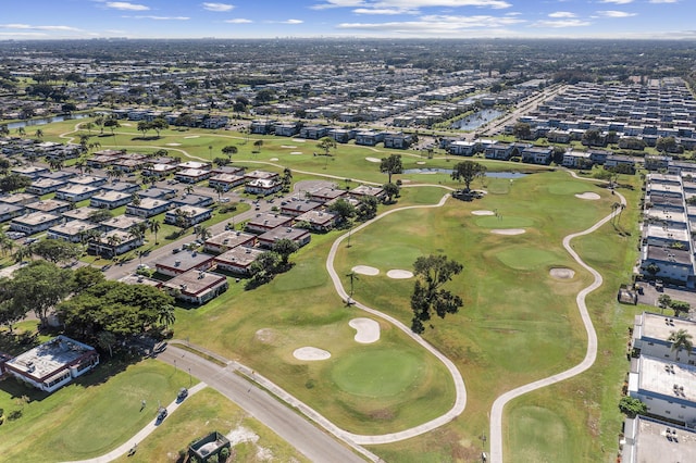 aerial view featuring a residential view and view of golf course