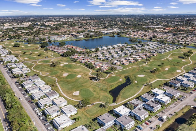 aerial view featuring a residential view, a water view, and golf course view