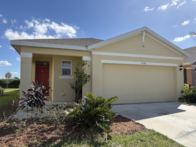 single story home with a garage