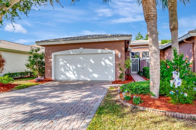 view of front of home with a garage