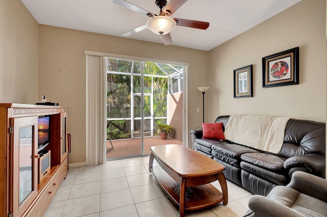 living room with ceiling fan and light tile patterned flooring