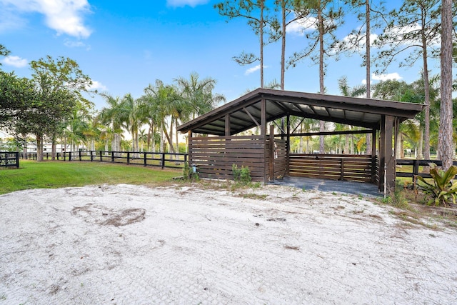 view of community featuring an outbuilding