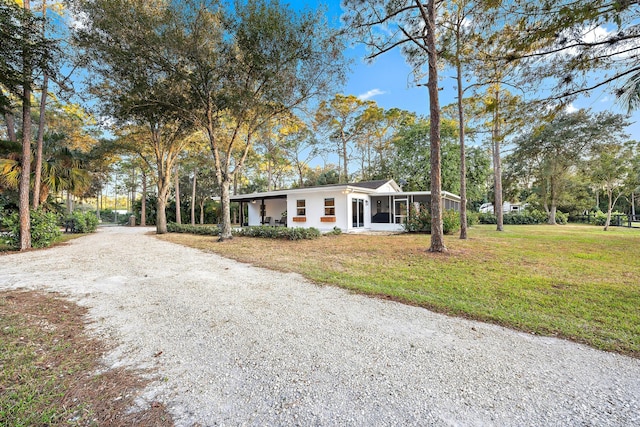 ranch-style house with a front yard