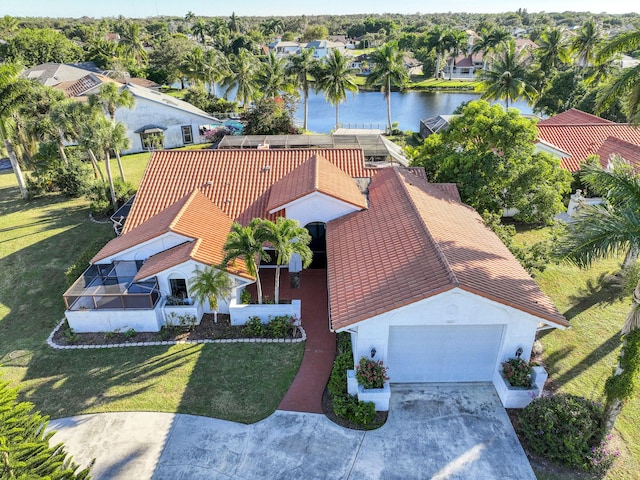 birds eye view of property featuring a water view