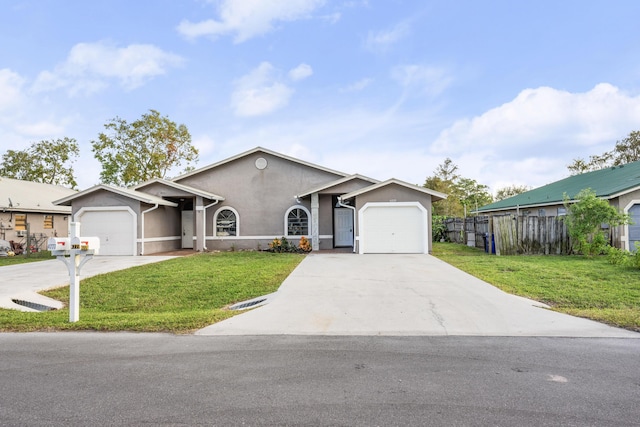 ranch-style house with a garage and a front lawn