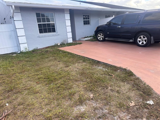 view of home's exterior featuring a yard