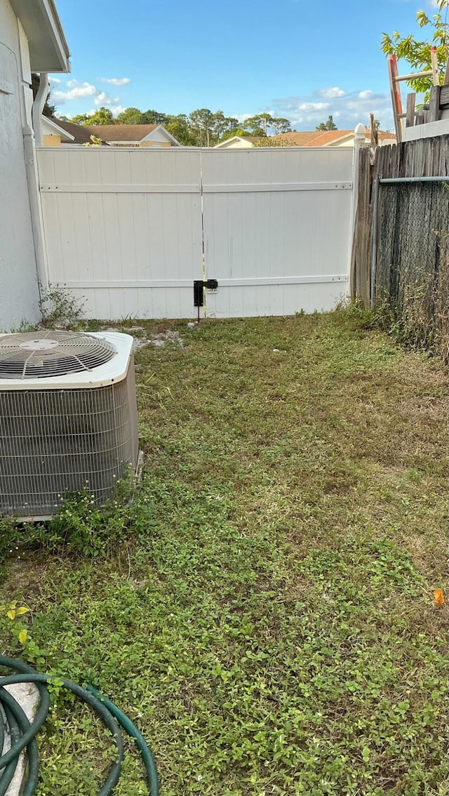 view of yard with cooling unit