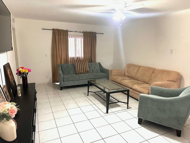 tiled living room featuring ceiling fan