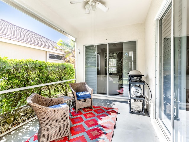 view of patio / terrace featuring ceiling fan