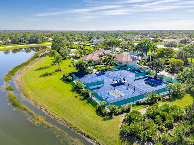 birds eye view of property with a water view